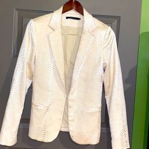 Cream colored arc and company blazer size small with snake pattern detail